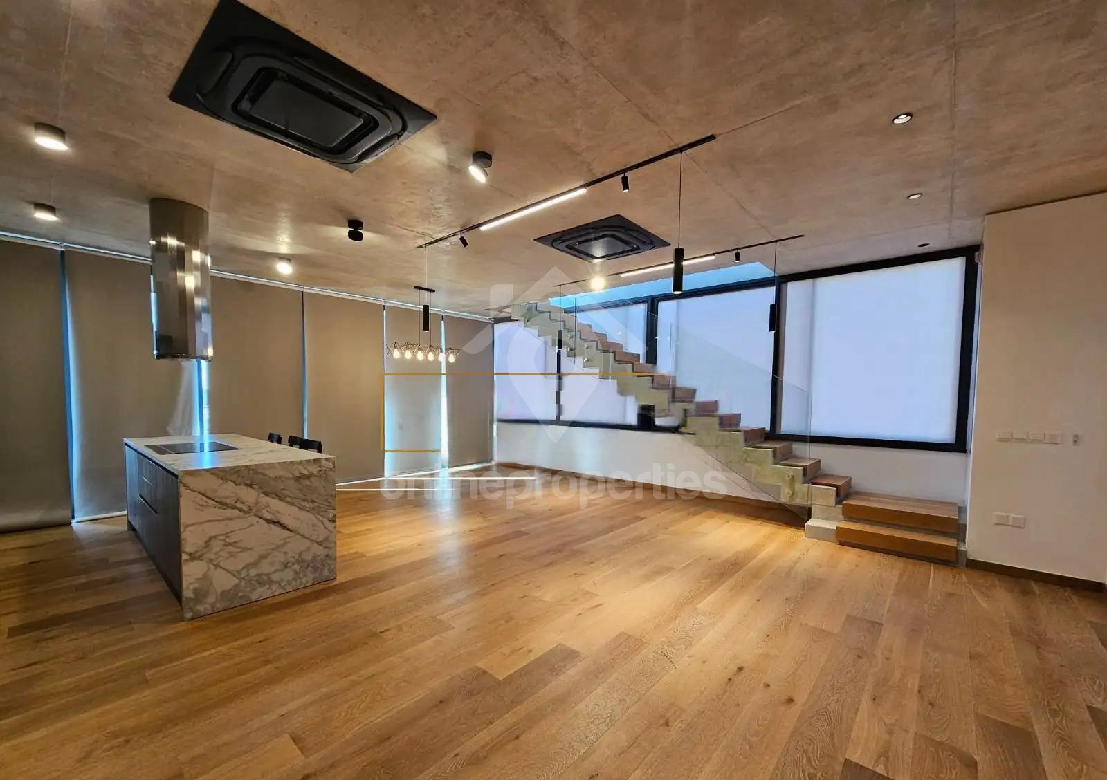 Exclusive Top-Floor Apartment in Prime Location